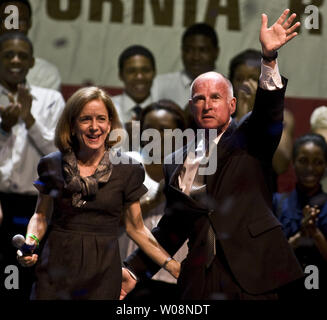 California Governor-elect Jerry Brown greets supporters at the Fox Theatre with his wife, Anne Gust (L) in Oakland, California on November 2, 2010. Brown defeated challenger Meg Whitman.    UPI/Terry Schmitt Stock Photo