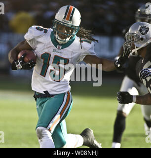 Miami Dolphins' Davone Bess runs the ball against the Buffalo Bills during  the third quarter of an NFL football game in Orchard Park, N.Y., Sunday, Dec.  18, 2011. (AP Photo/Derek Gee Stock