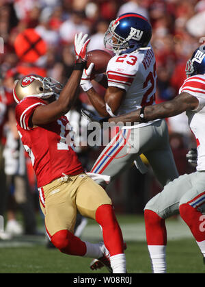 The New England Patriots' Randy Moss (81) can't pull in a pass against the New  York Giants' Corey Webster (23) in a 17-14 Giants victory in Super Bowl  XLII at University of