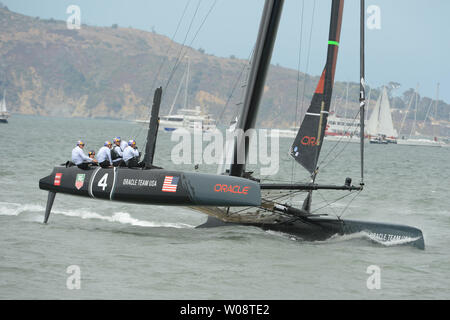 Oracle Team USA boat skippered by Jimmy Spithill sails downwind  during race one in the America's Cup World Series in San Francisco Bay on August 23, 2012. Eleven 45-foot catamarans representing eight teams are competing in the sailing series as a prelude to next year's America's Cup to be held in San Francisco.    UPI/Terry Schmitt Stock Photo