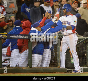 Dominican Republic's Jose Reyes, left, celebrates with teammate Nelson Cruz  their 9-0 victory over Panama at a World Baseball Classic game in San Juan,  Sunday, March 8, 2009. (AP Photo/Fernando Llano Stock