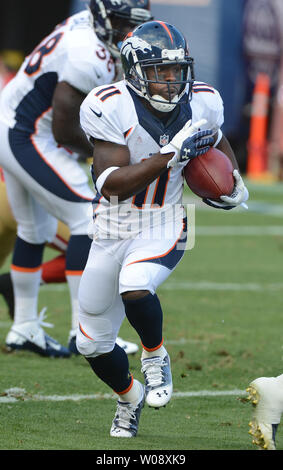 Denver Broncos Trindon Holliday (11) is dragged down by the San Francisco  49ers at Candlestick Park in San Francisco on August 8, 2013. The Broncos  defeated the 49ers 10-6. UPI/Terry Schmitt Stock Photo - Alamy