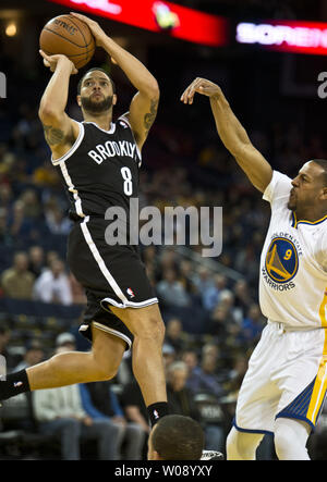 Brooklyn Nets' Deron Williams (8) shoots over Minnesota Timberwolves ...