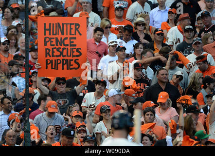 July 18, 2011; San Francisco, CA, USA; A San Francisco Giants fan holds up  a sign that reads beat LA during the ninth inning against the Los Angeles  Dodgers at AT&T Park.