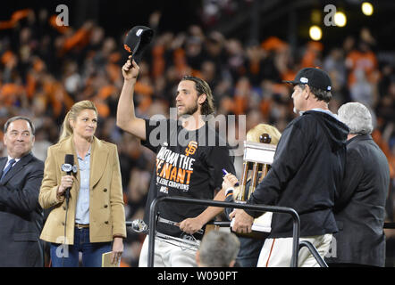 San Francisco Giants pitcher Madison Bumgarner tips his cap after winning the MVP trophy after the Giants beat the St. Louis Cardinals in game 5 of the National League Championship Series at AT&T Park in San Francisco on October 16, 2014.  The Giants defeated the Cardinals 6-3 on a walk-off 3-run home run by Travis Ishikawa to win the National League pennant. San Francisco won the series 4-1 and advance to the World Series against the Kansas City Royals.  UPI/Terry Schmitt Stock Photo