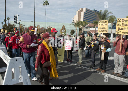 San Francisco 49ers fans walk outside of Levi's Stadium before an NFL