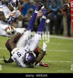 San Francisco 49ERS Jaquiski Tartt leaps while NaVorro Bowman tackles New  York Giants Odell Beckham Jr. after in the first half at MetLife Stadium in  East Rutherford, New Jersey on October 11