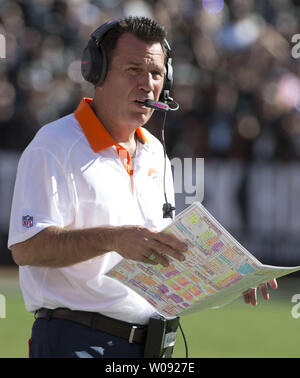 Denver Broncos Head Coach Gary Kubiak is doused with Gatorade at