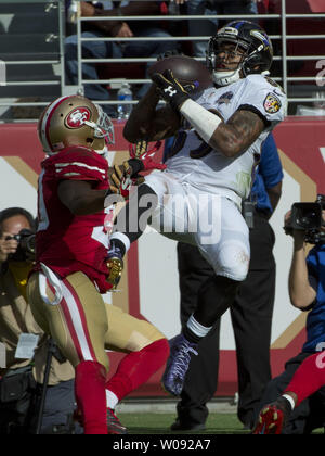 Baltimore Ravens WR Steve Smith (R) hauls in a 34 yard pass from QB Joe Flacco over San Francisco 49ers Kenneth Acker (L) in the third quarter at Levi's Stadium in Santa Clara, California on October 18, 2015. The 49ers defeated the Ravens 25-20.      Photo by Terry Schmitt/UPI Stock Photo