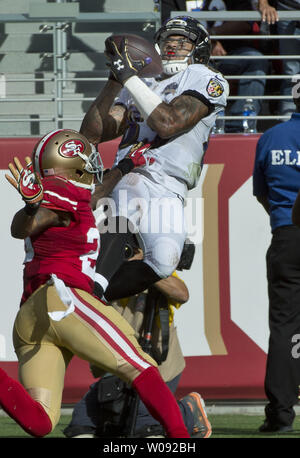 Baltimore Ravens WR Steve Smith (R) hauls in a 34 yard pass from QB Joe Flacco over San Francisco 49ers Kenneth Acker (L) in the third quarter at Levi's Stadium in Santa Clara, California on October 18, 2015. The 49ers defeated the Ravens 25-20.      Photo by Terry Schmitt/UPI Stock Photo