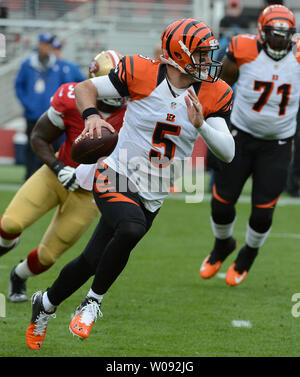 Cincinnati Bengals QB AJ McCarron (5) scrambles for a yard against the San Francisco 49ers in the first quarter at Levi's Stadium in Santa Clara, California on December 20, 2015.     Photo by Terry Schmitt/UPI Stock Photo