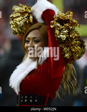 A member of the San Francisco 49ers Gold Rush entertains during quarters at Levi's Stadium in Santa Clara, California on December 20, 2015. The Cincinnati Bengals defeated the 49ers 24-14.    Photo by Terry Schmitt/UPI Stock Photo