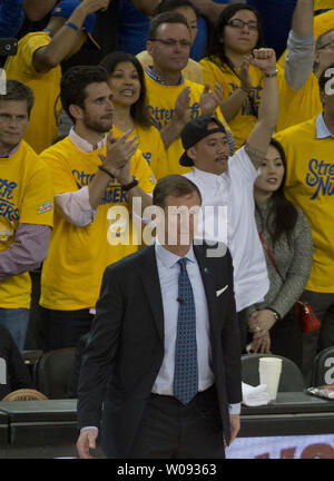 Portland Trail Blazers head coach Terry Stotts watches impassively as the Golden State Warriors pull ahead in the fourth period of game two of the NBA Western Semis at Oracle Arena in Oakland, California on May 3, 2016. The Warriors came from behind in the fourth period to beat the Trail Blazers 110-99.     Photo by Terry Schmitt/UPI Stock Photo