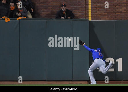 Chicago Cubs center fielder Albert Almora Jr. can't catch a 2-RBI triple by San Francisco Giants' Conor Gillaspie in the eighth inning during National League Division Series Game 3 at AT&T Park in San Francisco, October 10, 2016. Photo by Terry Schmitt/UPI Stock Photo