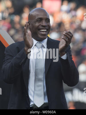 Former San Francisco Giants player Barry Bonds applauds fans during a ceremony to retire his jersey number before a baseball game between the Giants and the Pittsburgh Pirates in San Francisco on August 11, 2018. Photo by Terry Schmitt/UPI Stock Photo