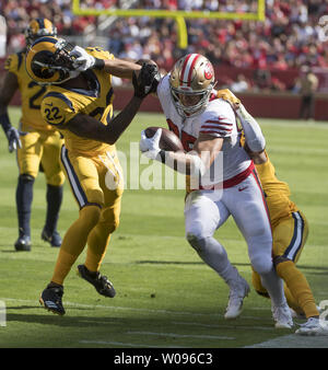 Los Angeles Rams Marcus Peters (22) leaps backwards across the