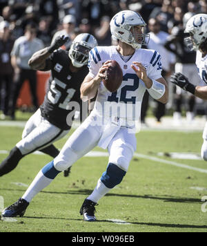 Indianapolis Colts QB Andrew Luck (12) drops back to pass against the Oakland Raiders in the first quarter at the Coliseum Oakland, California on October 28, 2018. The Colts defeated the Raiders 42-28.         Photo by Terry Schmitt/UPI Stock Photo
