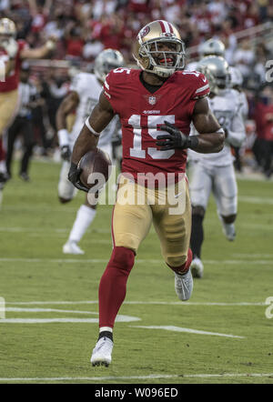 San Francisco 49ers wide receiver Pierre Garcon (15) romps toward the endzone unmolested on a 24 yard pass from quarterback Nick Mullens (4) in the first quarter against the Oakland Raiders at Levi's Stadium in Santa Clara, California on November 1, 2018. 49ers Mullin passed 1622 with three touchdowns for one of the best NFL debuts statistically in the 34-3 drubbing of the Raiders.    Photo by Terry Schmitt/UPI Stock Photo
