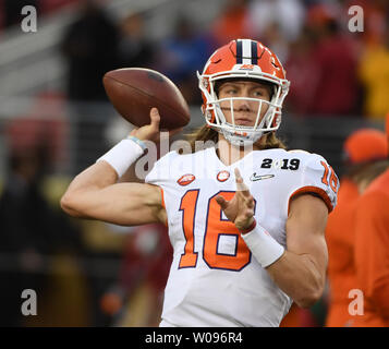 Clemson quarterback Trevor Lawrence warms up before the start of an ...