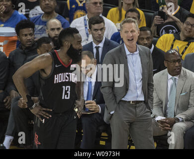 Houston Rockets guard James Harden (13) chats with Golden State Warriors coach Steve Kerr during a foul shot in the first half one game one of the Western Conference Semi-Finals of NBA Playoffs at Oracle Arena in Oakland, California on April 28, 2019.      Photo by Terry Schmitt/UPI Stock Photo