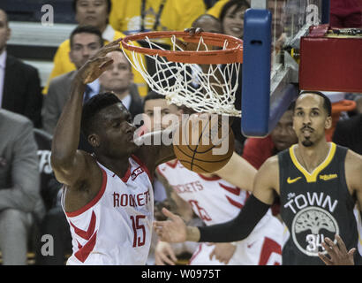 Houston Rockets center Clint Capela (15) dunks as Golden State Warriors guard Shaun Livingston (34) watches in the first half of game two of the Western Conference Semi-Finals of NBA Playoffs at Oracle Arena in Oakland, California on April 30, 2019. The Warriors defeated the Rockets 115-109 to take a 2-0 lead in the series.    Photo by Terry Schmitt/UPI Stock Photo