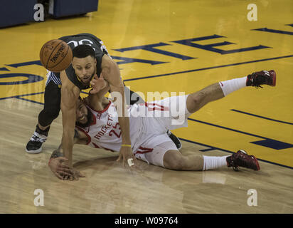 Stephen Curry (30) steals the ball from Paul Pierce (34)in