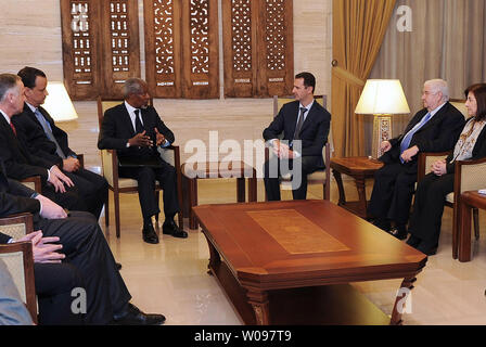 In this photo released by the Syrian official news agency SANA, Syrian President Bashar Assad, right, meets with Kofi Annan, the United Nations special envoy to Syria, in Damascus, Syria on March 10, 2012.      UPI Stock Photo