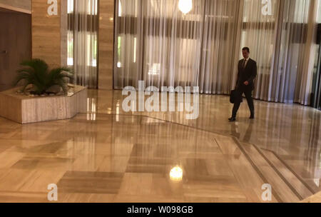 An image grab taken from a video released by the official Twitter page of the Syrian Presidency on April 14, 2018, shows President Bashar al-Assad walking into an administrative building in the Syrian capital Damascus, to condemn the strikes carried out by the United States, Britain and France against the Syrian regime. The United States, Britain and France carried out a wave of punitive strikes against Bashar al-Assad's Syrian regime on Saturday in response to alleged chemical weapons attacks. Photo by /UPI Stock Photo