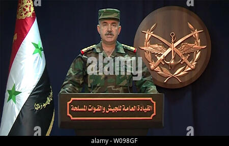 An image grab taken from a video released by the official Twitter page of the Syrian Presidency on April 14, 2018, shows Syrian Defense Ministry spokesman  speaks to Journalists in the Syrian capital Damascus, to condemn the strikes carried out by the United States, Britain and France against the Syrian regime. The United States, Britain and France carried out a wave of punitive strikes against Bashar al-Assad's Syrian regime on Saturday in response to alleged chemical weapons attacks. Photo by /UPI Stock Photo