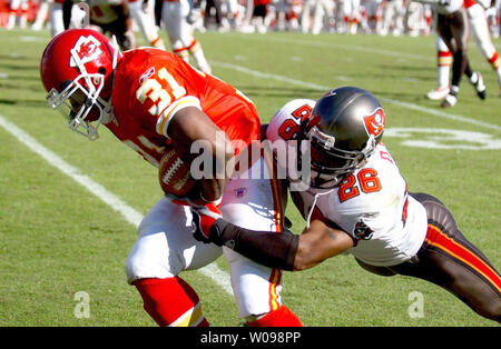 Dec. 9, 2012 - Tampa, Florida, U.S. - Tampa Bay Buccaneers 2002 Superbowl  team members Warren Sapp (front left), Mike Alstott (center) and Dwight  Smith (right) check out their old friend, the