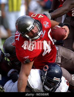 Tampa Bay Buccaneers' running back Michael Pittman (32) advances the ball  as fullback Mike Alstott (40) runs interference after a handoff from  quarterback Brad Johnson (14). The Denver Broncos beat the Tampa