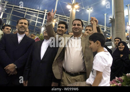 Iranian nuclear scientist Shahram Amiri arrives and is greeted by relatives and friends after arriving at Imam Khomeini airport in Tehran, Iran on July 15, 2010.   Amiri claimed he was adducted by American agents last year while the U.S. says he was a willing defector who changed his mind.       UPI/Maryam Rahmanian Stock Photo