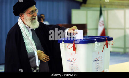 Iran's Supreme Leader Ayatollah Khamenei casts his ballot at a polling station in Tehran, Iran on May 4, 2012. Iranians started voting in the second round of the ninth parliamentary election since the Islamic Revolution in 1979.  Photo from official Leader's website.   UPI Stock Photo