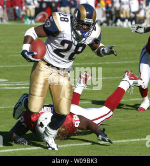 St. Louis Rams Marshall Faulk (L) congratulates Isaac Bruce after Bruce  scored a touchdown against the Seattle Seahawks in the first quarter at the  Edward Jones Dome in St. Louis on December