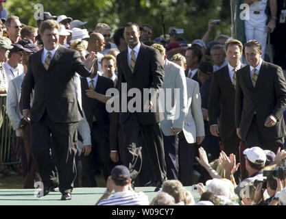 USA captian Hal Sutton (L) leads members of the USA team, Tiger Woods, Davis Love III and Phil Mickelson as they arrive for the opening festivities for the 2004 Ryder Cup Matches at Oakland Hills Country Club in Bloombfield Township, Michigan on Thursday, Sept. 16, 2004. Match play starts Friday, Sept. 17th. (UPI Photo/Tannen Maury) Stock Photo