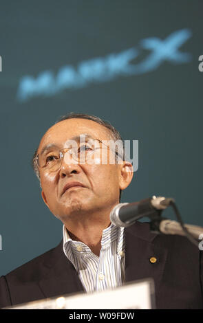 Katsuaki Watanabe, president of Toyota Motor Corporation, answers reporters' questions during a  press conference in Tokyo, Japan, on September 26, 2007, in which a new model 'Mark X Zio', available only in the Japanese market, was announced. (UPI Photo/Keizo Mori) Stock Photo