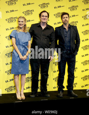 (L-R) French actress Julie Dreyfus, director Quentin Tarantino, actor Brad Pitt, attend a press conference for the film 'Inglourious Basterds' in Tokyo, Japan, on November 4, 2009.     UPI/STR Stock Photo