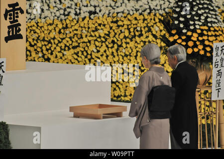 Japan's Emperor Akihito (R) and Empress Michiko (L) attend the memorial service for the war dead of World War II marking the 67th anniversary in Tokyo, Japan on August 15, 2012.     UPI/Keizo Mori Stock Photo
