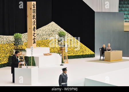 Japan's Prime Minister Yoshihiko Noda(L) attends the memorial service for the war dead of World War II marking the 67th anniversary in Tokyo, Japan on August 15, 2012.     UPI/Keizo Mori Stock Photo