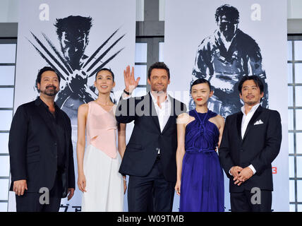 (L-R) Director James Mangold, Japanese actress Tao Okamoto, actor Hugh Jackman, actress Rila Fukushima, and actor Hiroyuki Sanada attend the Japan premiere for the film 'The Wolverine' in Tokyo, Japan on August 28, 2013.     UPI/Keizo Mori Stock Photo