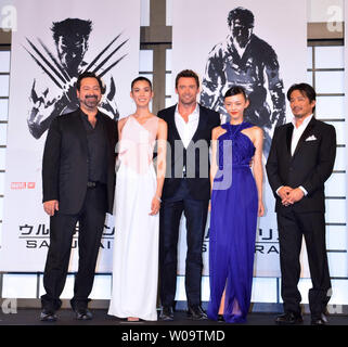 (L-R) Director James Mangold, Japanese actress Tao Okamoto, actor Hugh Jackman, actress Rila Fukushima, and actor Hiroyuki Sanada attend the Japan premiere for the film 'The Wolverine' in Tokyo, Japan on August 28, 2013.     UPI/Keizo Mori Stock Photo