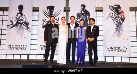 (L-R) Director James Mangold, Japanese actress Tao Okamoto, actor Hugh Jackman, actress Rila Fukushima, and actor Hiroyuki Sanada attend the Japan premiere for the film 'The Wolverine' in Tokyo, Japan on August 28, 2013.     UPI/Keizo Mori Stock Photo