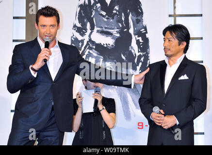 Actor Hugh Jackman(L) and Japanese actor Hiroyuki Sanada attend the Japan premiere for the film 'The Wolverine' in Tokyo, Japan, on August 28, 2013.     UPI/Keizo Mori Stock Photo