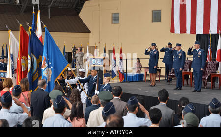 (L-R) Pacific Air Forces commander Gen. Lori Robinson, U.S. Forces Japan Commander, Lt. Gen. John Dolan and Lt. Gen. Salvatore Angelella salute a change of command ceremony at Yokota air base in Tokyo, Japan, on June 5, 2015.     Photo by Keizo Mori/UPI Stock Photo