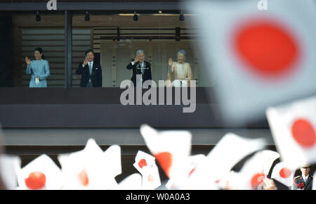 Japan's Emperor Akihito(R2) waves to well-wishers with Empress Michiko(R), Crown prince Naruhito(L2) and Crown princess Masako(L) during a New Year greeting at the East Plaza, Imperial Palace in Tokyo, Japan, on January 2, 2016.     Photo by Keizo Mori/UPI Stock Photo