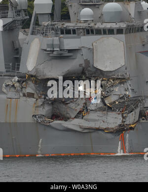 The damaged part of the USS Fitzgerald is seen at the Fleet Activities Yokosuka in Kanagawa-Prefecture, Japan, on June 18, 2017. The bodies of seven U.S. sailors missing after the Navy destroyer collided with a Philippine-flagged merchant ship, the ACX Crystal, at around 2:30 a.m. Saturday, were found in flooded berthing compartments, a defense official said.     Photo by Keizo Mori/UPI Stock Photo