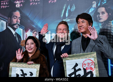 (L-R) Actors Momiji Yamamura, Kenneth Branagh and Masao Kusakari attend the Japan premier for the film 'Murder on the Orient Express' in Tokyo, Japan on December 5, 2017.     Photo by Keizo Mori/UPI Stock Photo