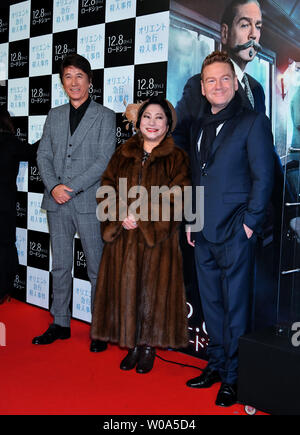 (L-R) Actors Masao Kusakari, Momiji Yamamura and Kenneth Branagh attend the Japan premier for the film 'Murder on the Orient Express' in Tokyo, Japan on December 5, 2017.     Photo by Keizo Mori/UPI Stock Photo