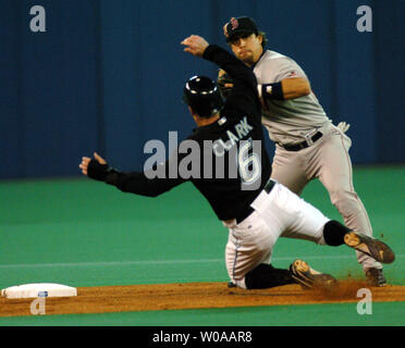 Boston Red Sox's Mark Bellhorn (12) tags out Chicago Cubs' Aramis Ramirez  (16) after he tried to strech a single into a double. The Chicago Cubs  defeated the Boston Red Sox 14-6