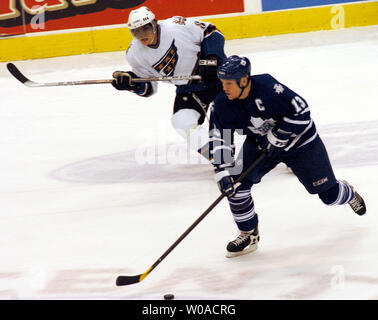 Toronto Maple Leafs captain Mats Sundin takes the puck up the ice as Washington Capitals' Alexander Ovechkin chases him in first period action at the Air Canada Center in Toronto, Canada on February 28, 2006. The Capitals went on to defeat the Leafs 5-3. (UPI Photo/Christine Chew) Stock Photo